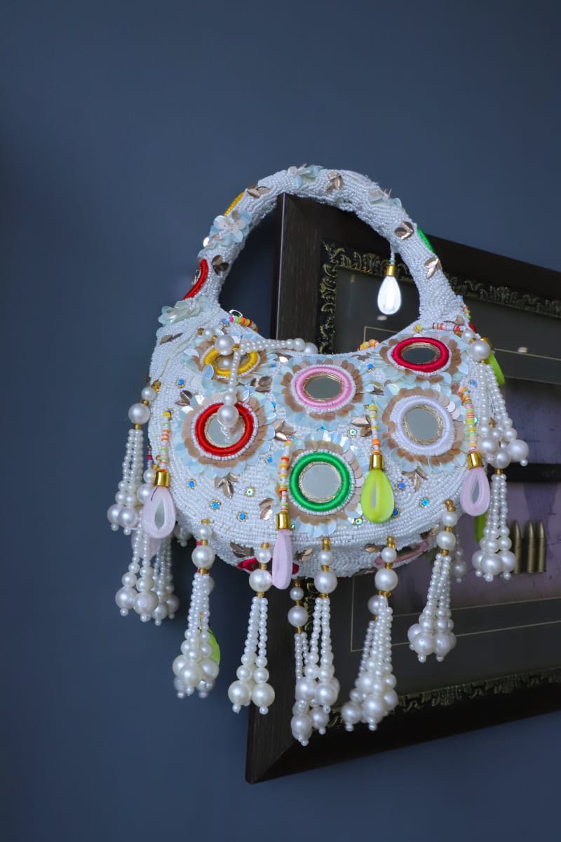 Multi beaded mirror clutch