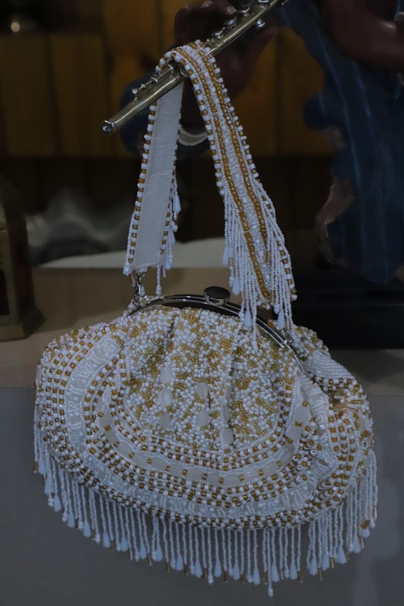 White gold beaded clutch bag
