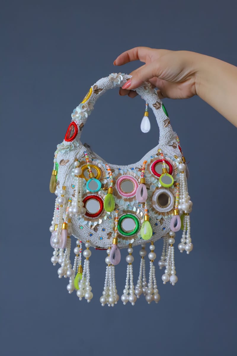 Multi beaded mirror clutch