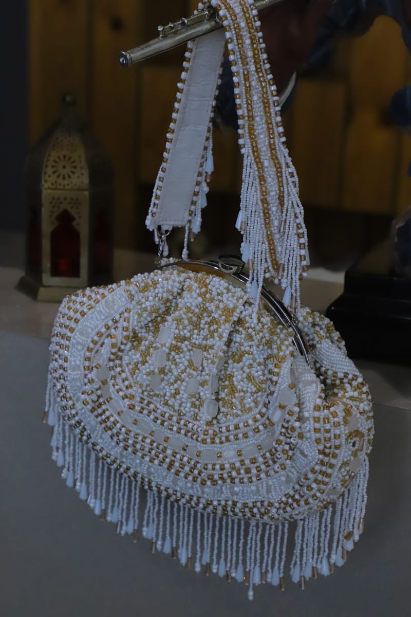 White gold beaded clutch bag