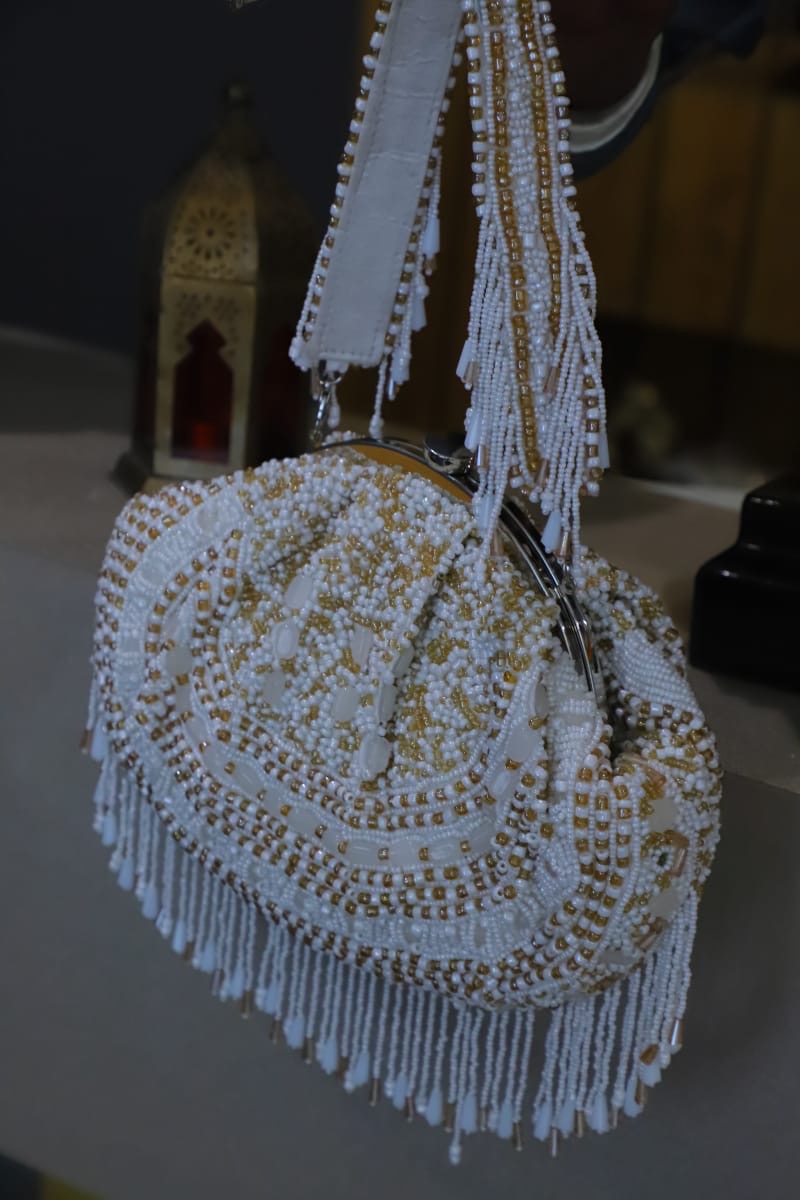 White gold beaded clutch bag