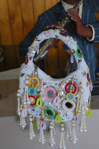 Multi beaded mirror clutch