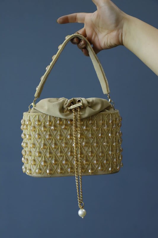 Beige crystal bucket bag