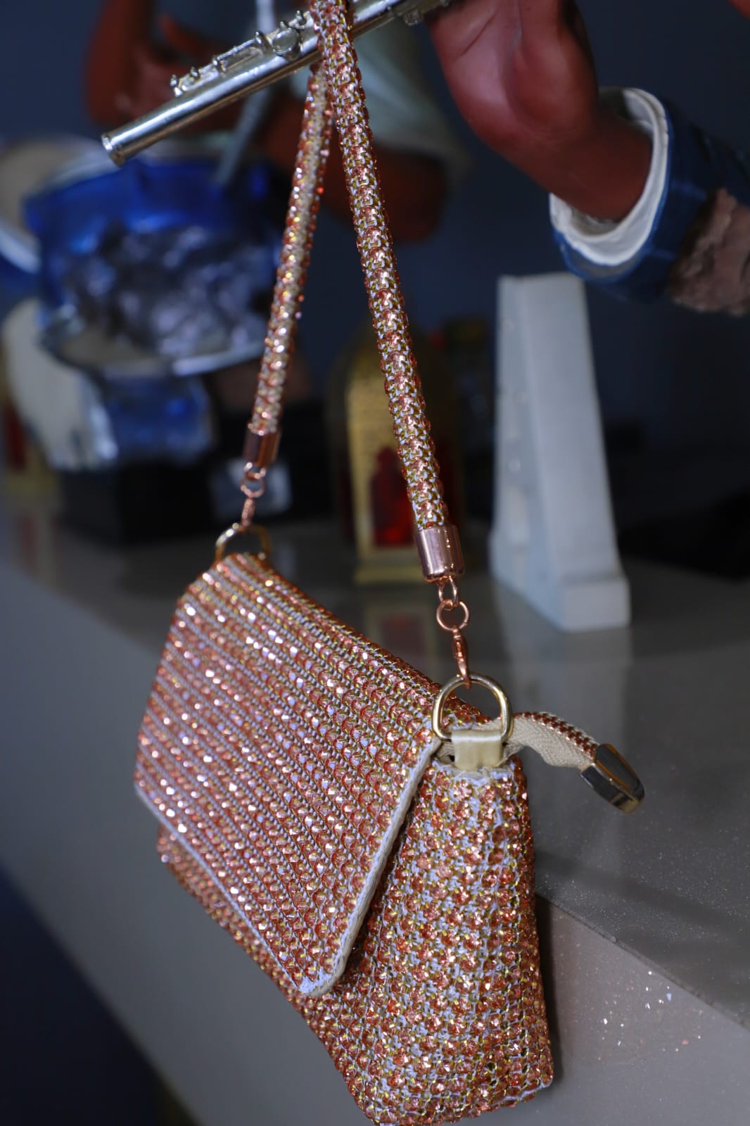 Rose gold Swaroski clutch bag