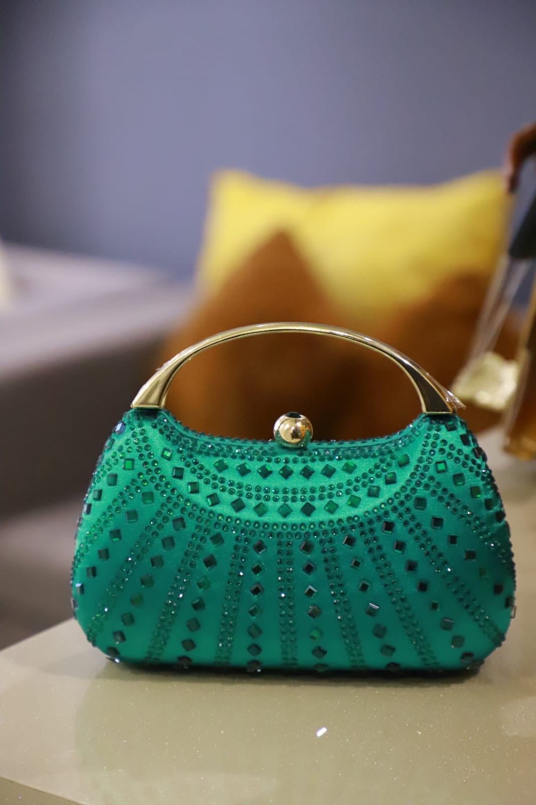 Green stone satin clutch bag