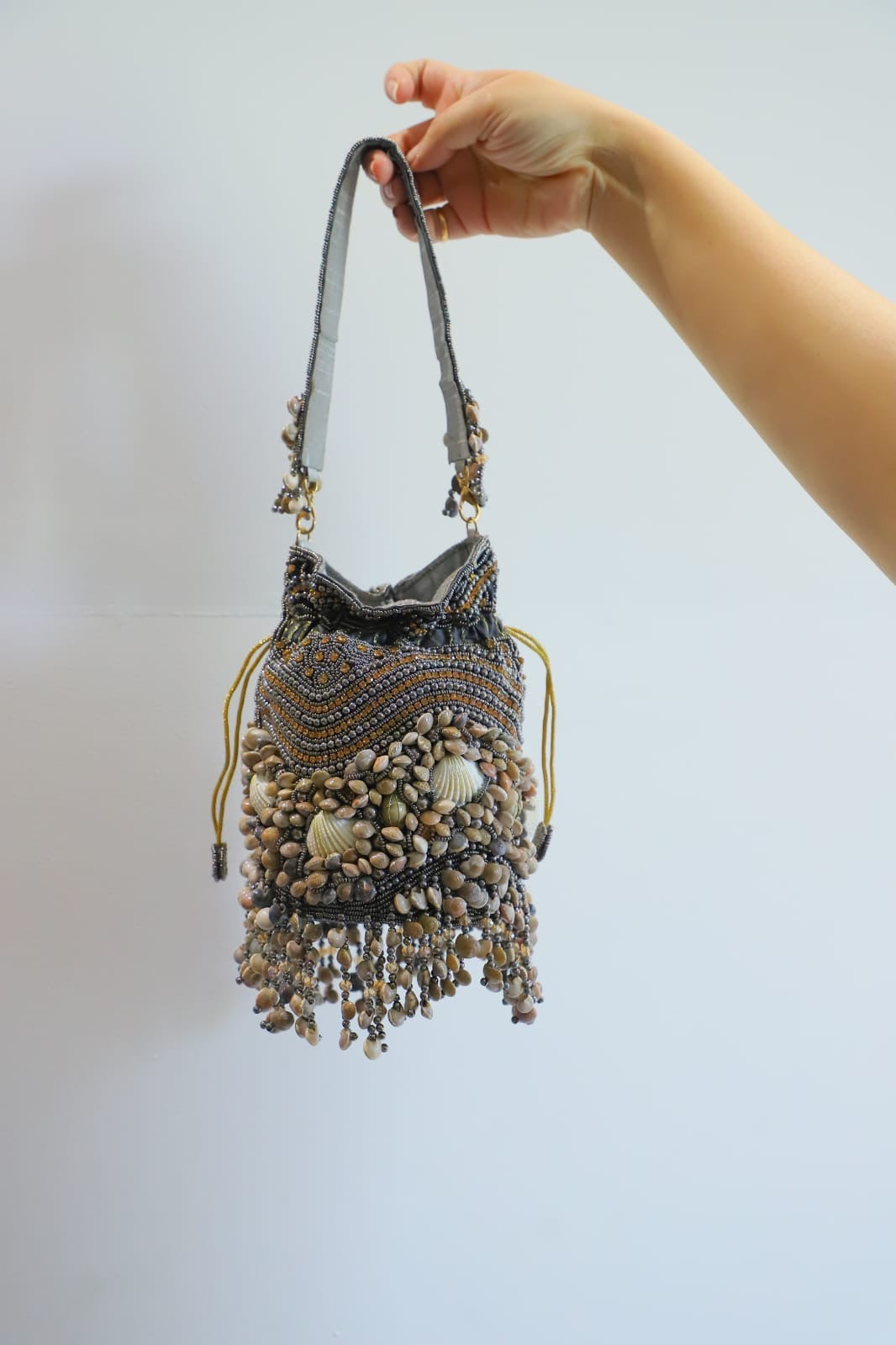 The Shell Embellished Potli Bag