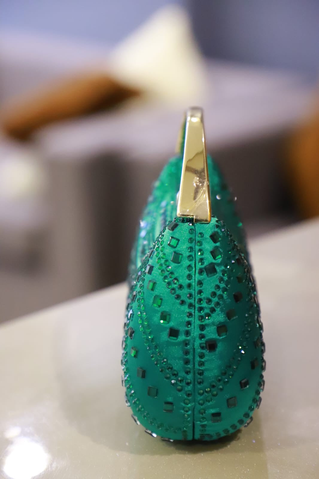 Green stone satin clutch bag