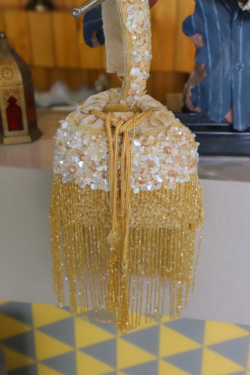 Golden tassel Potli
