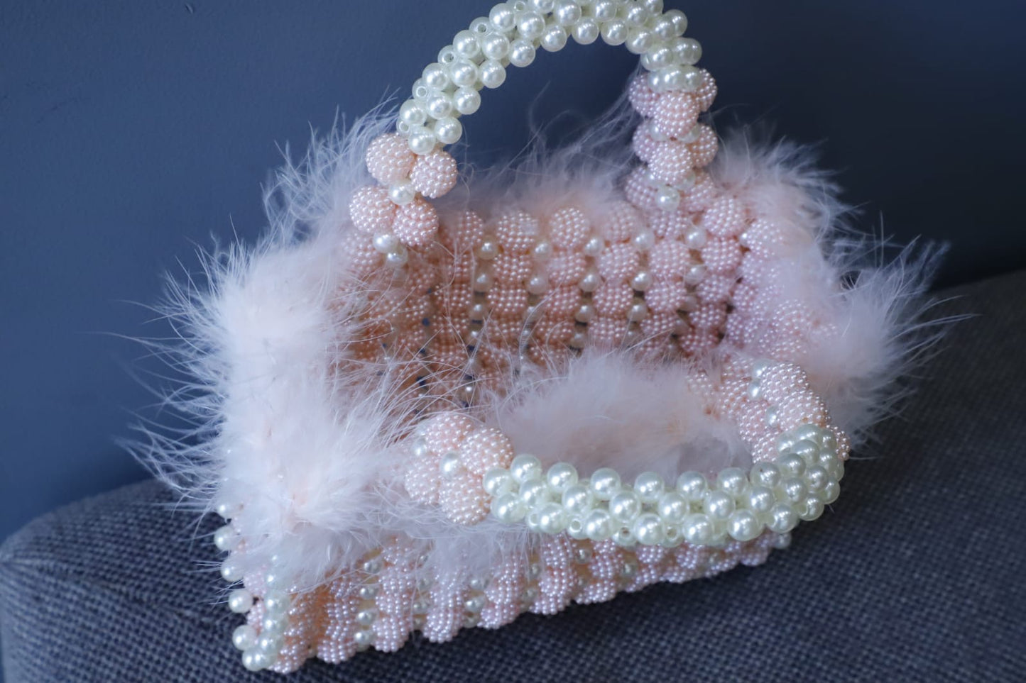 Pink feather beaded open clutch bag