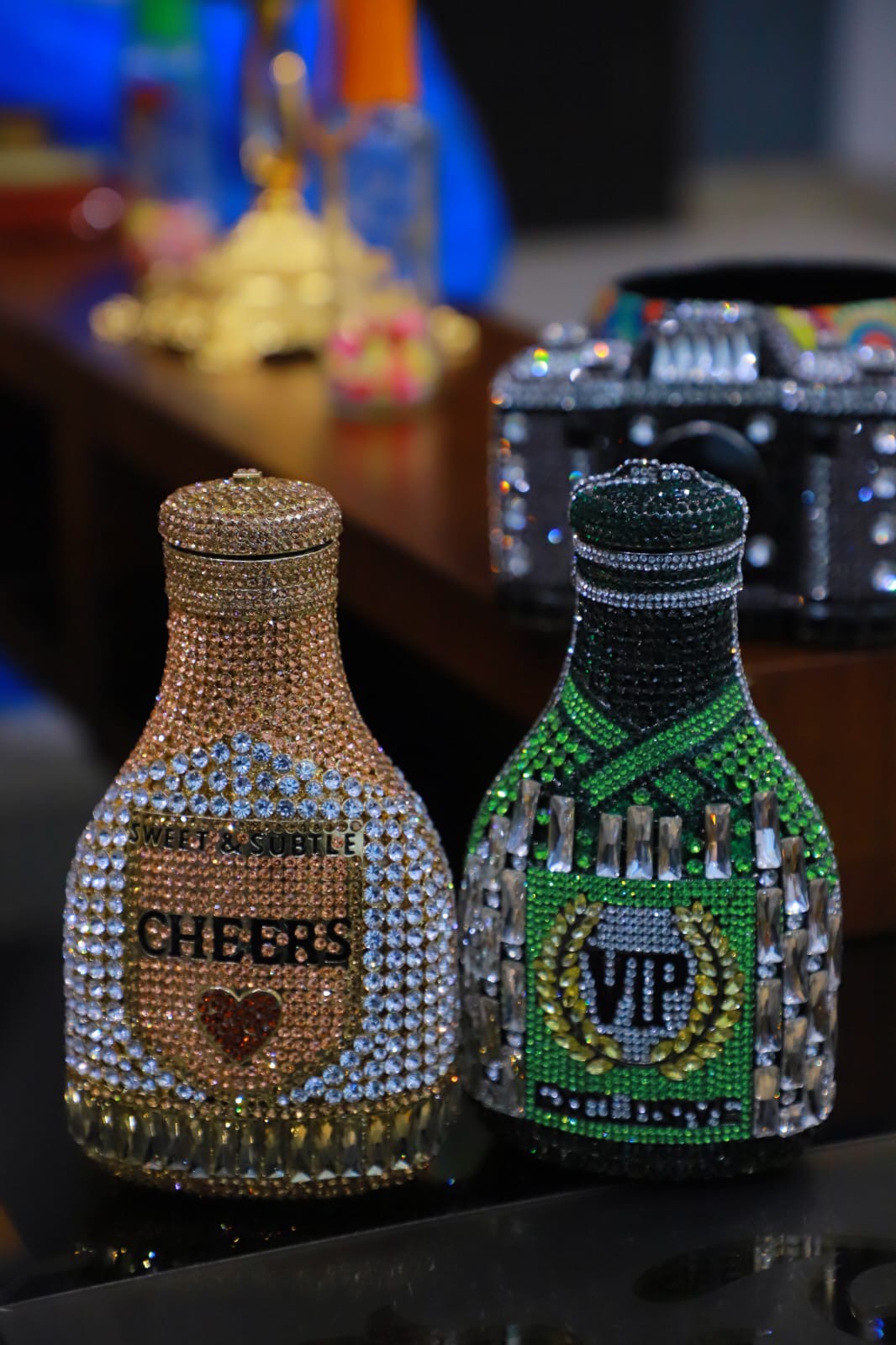 Bottle swaroski clutch bag