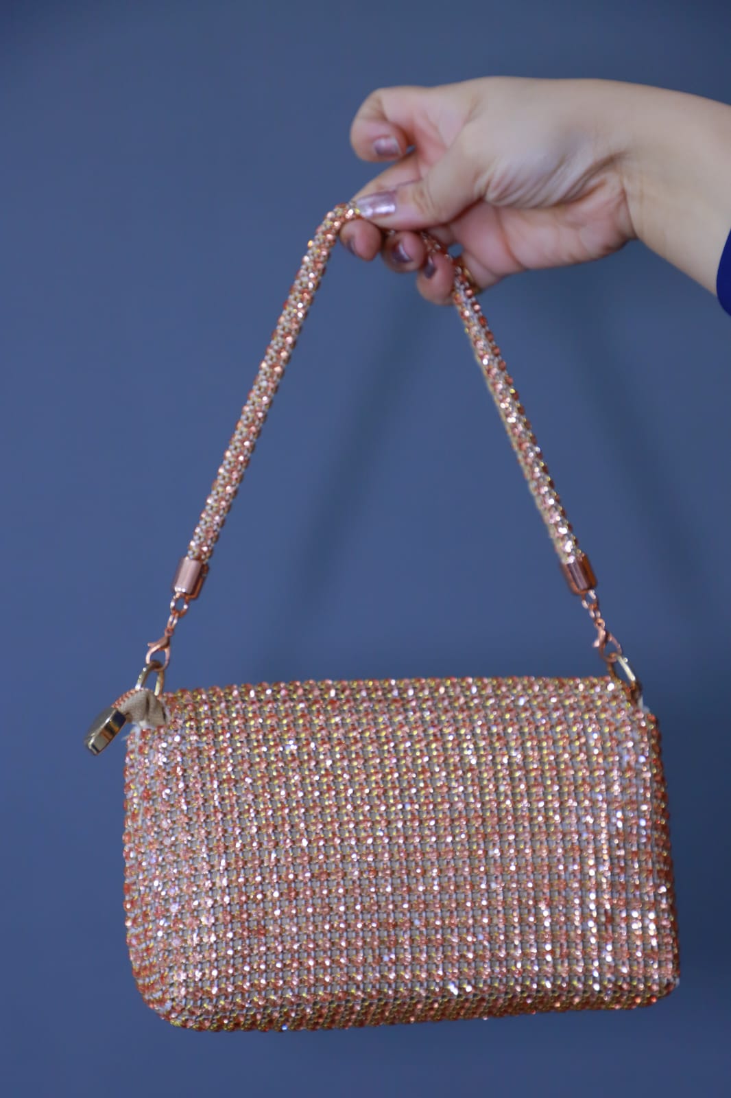 Rose gold Swaroski clutch bag