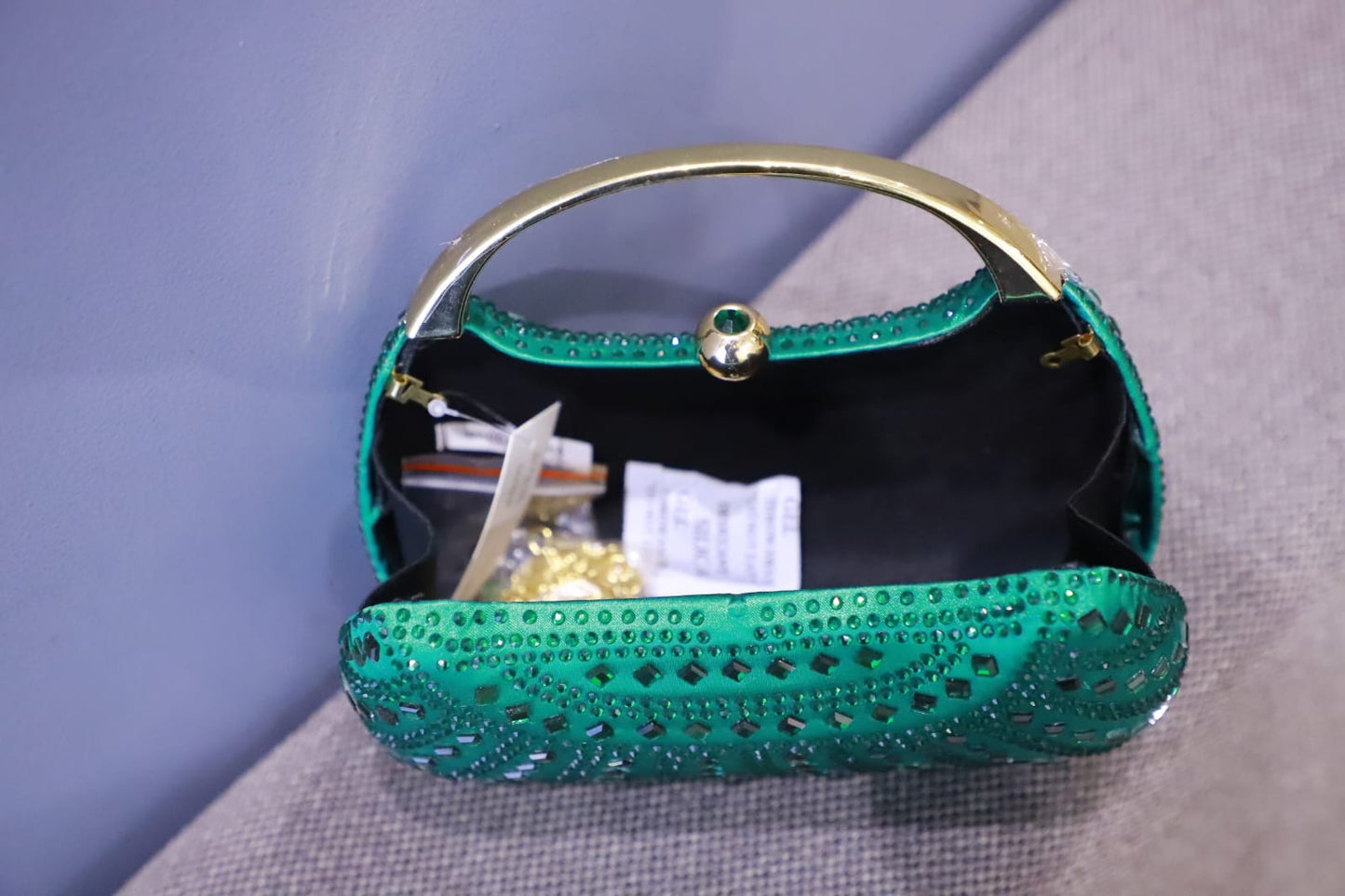 Green stone satin clutch bag