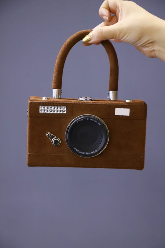 Camera clutch sling