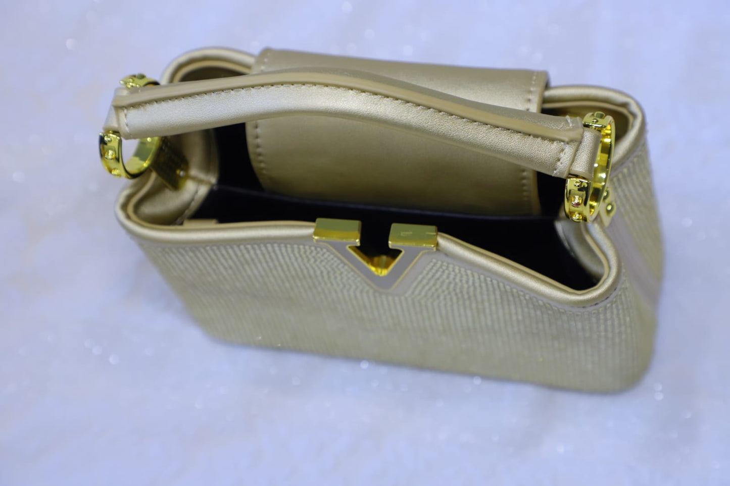 Golden Swaroski clutch bag