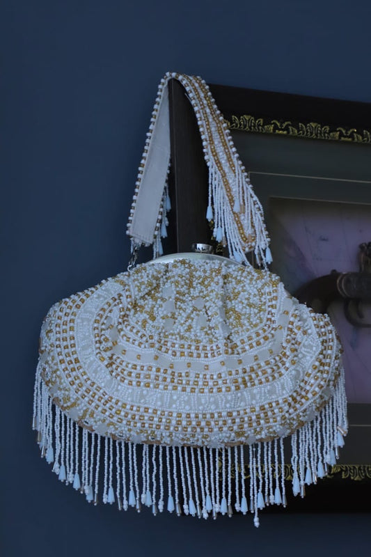 White gold beaded clutch bag