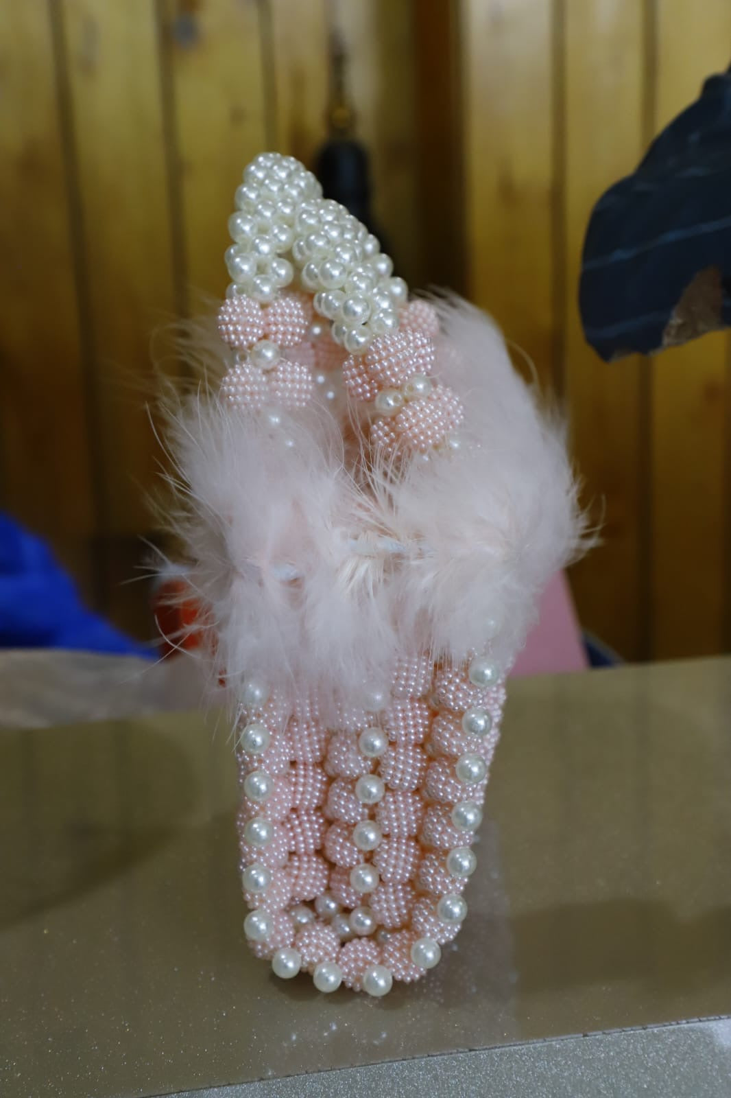 Pink feather beaded open clutch bag