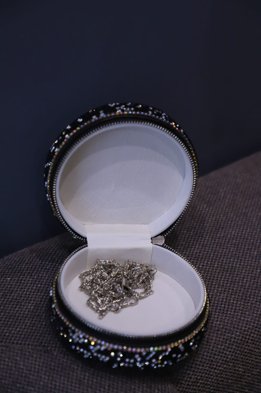 Round mini Swaroski sling clutch