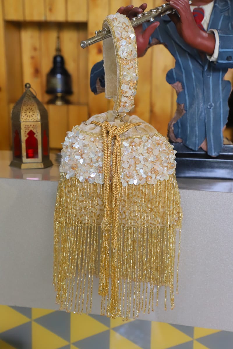 Golden tassel Potli