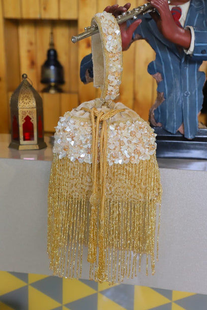 Golden tassel Potli