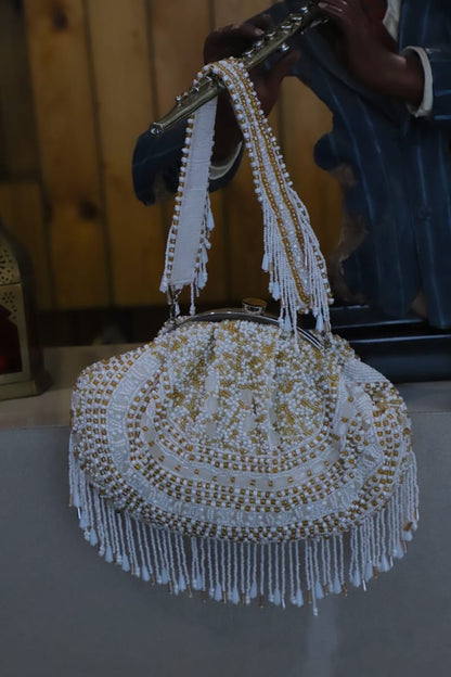 White gold beaded clutch bag