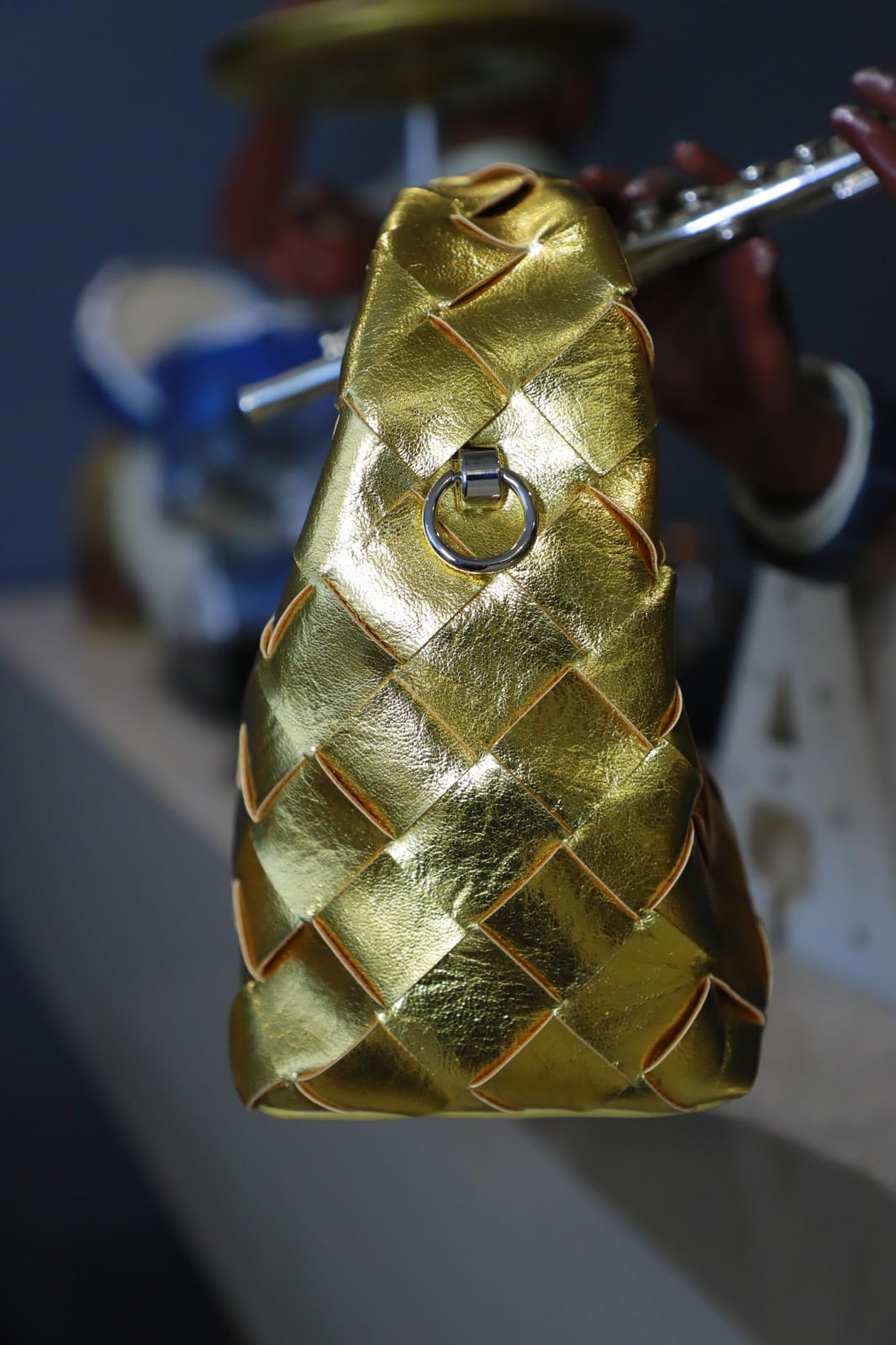 Golden rexin clutch bag