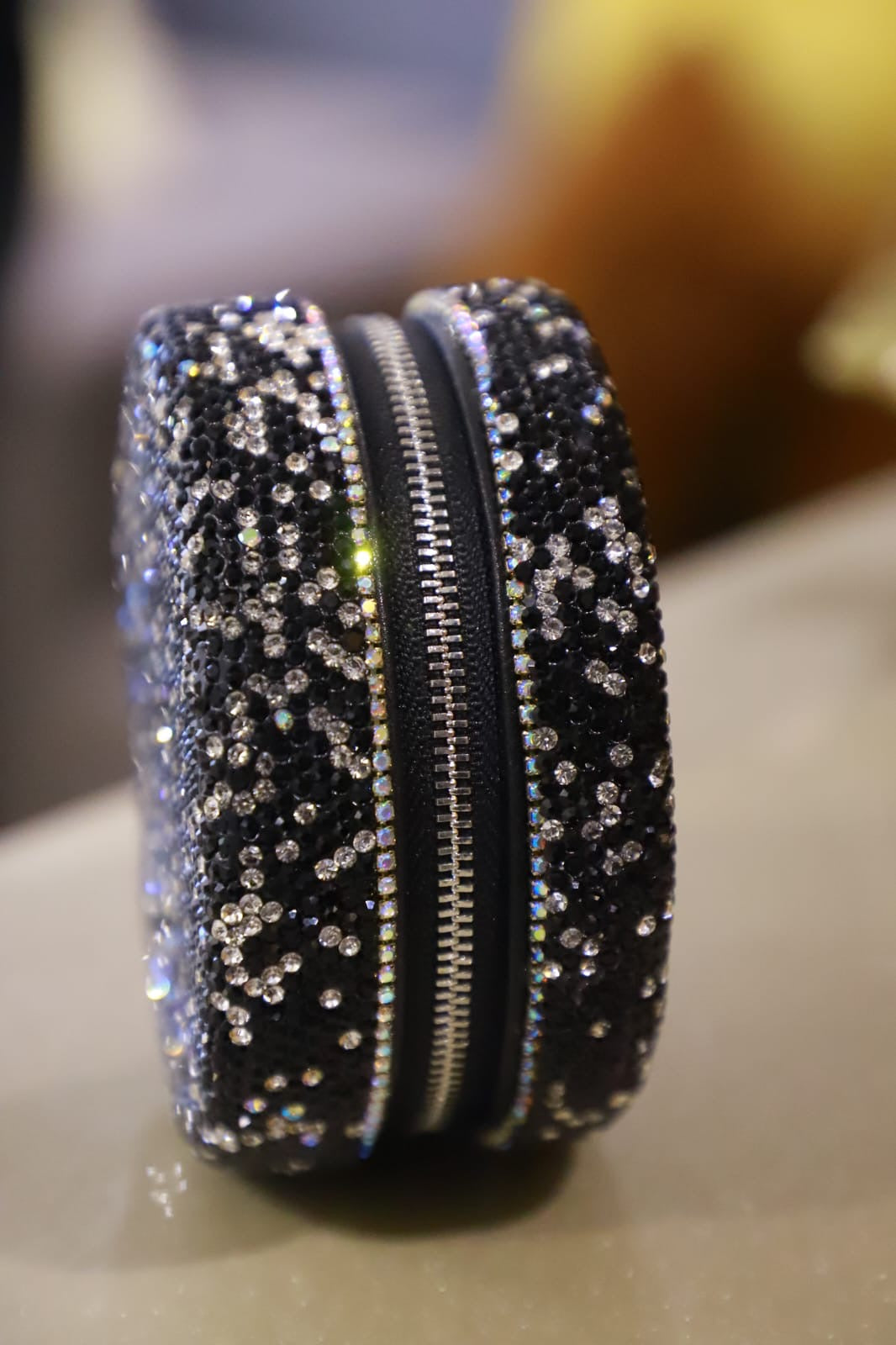 Round mini Swaroski sling clutch