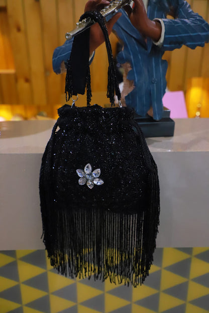 Black cutdaana potli
