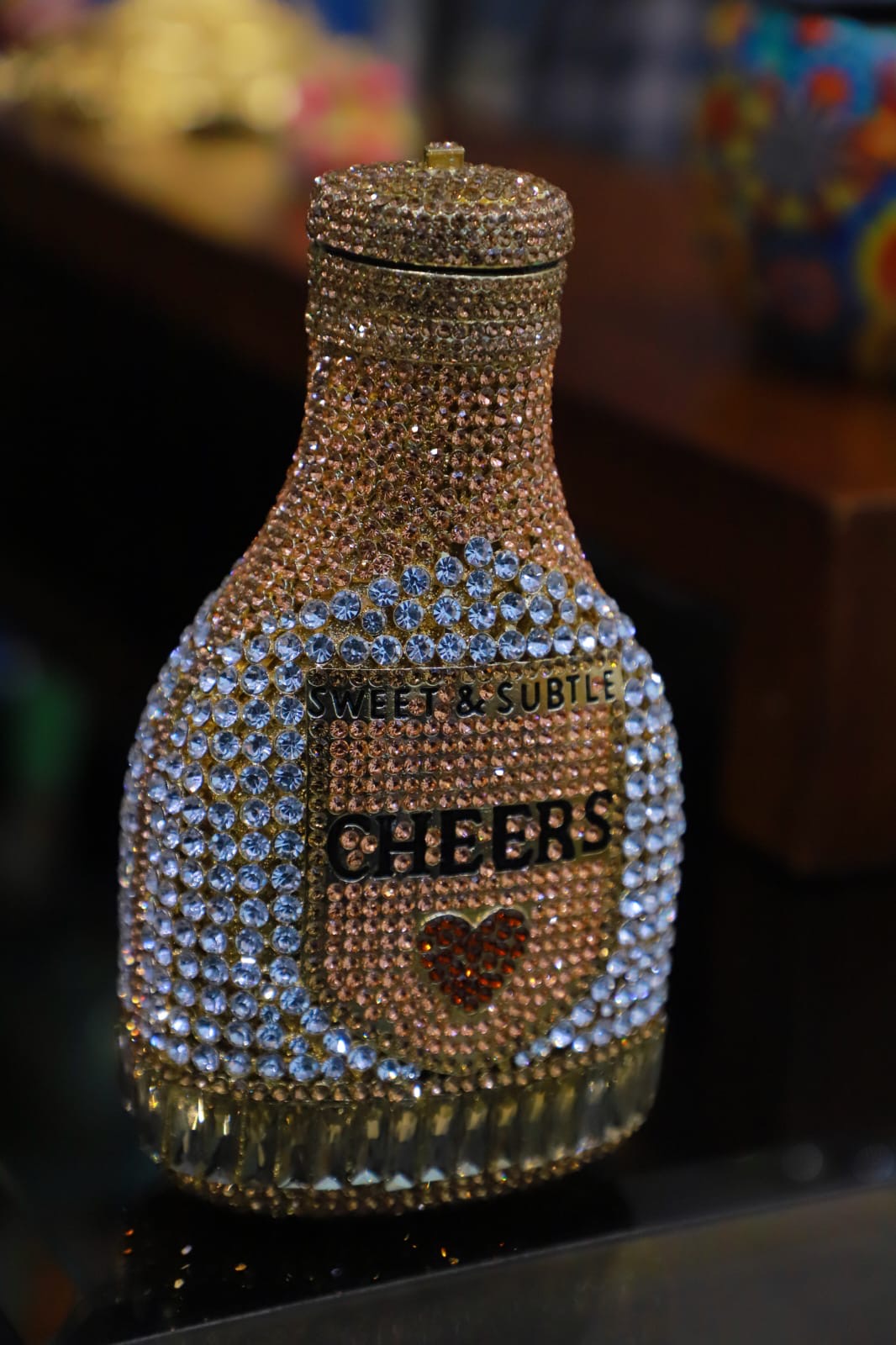 Bottle swaroski clutch bag