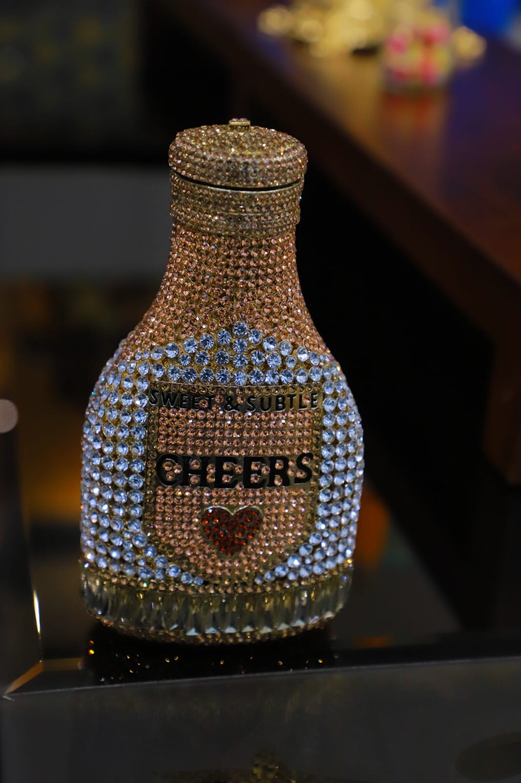 Bottle swaroski clutch bag