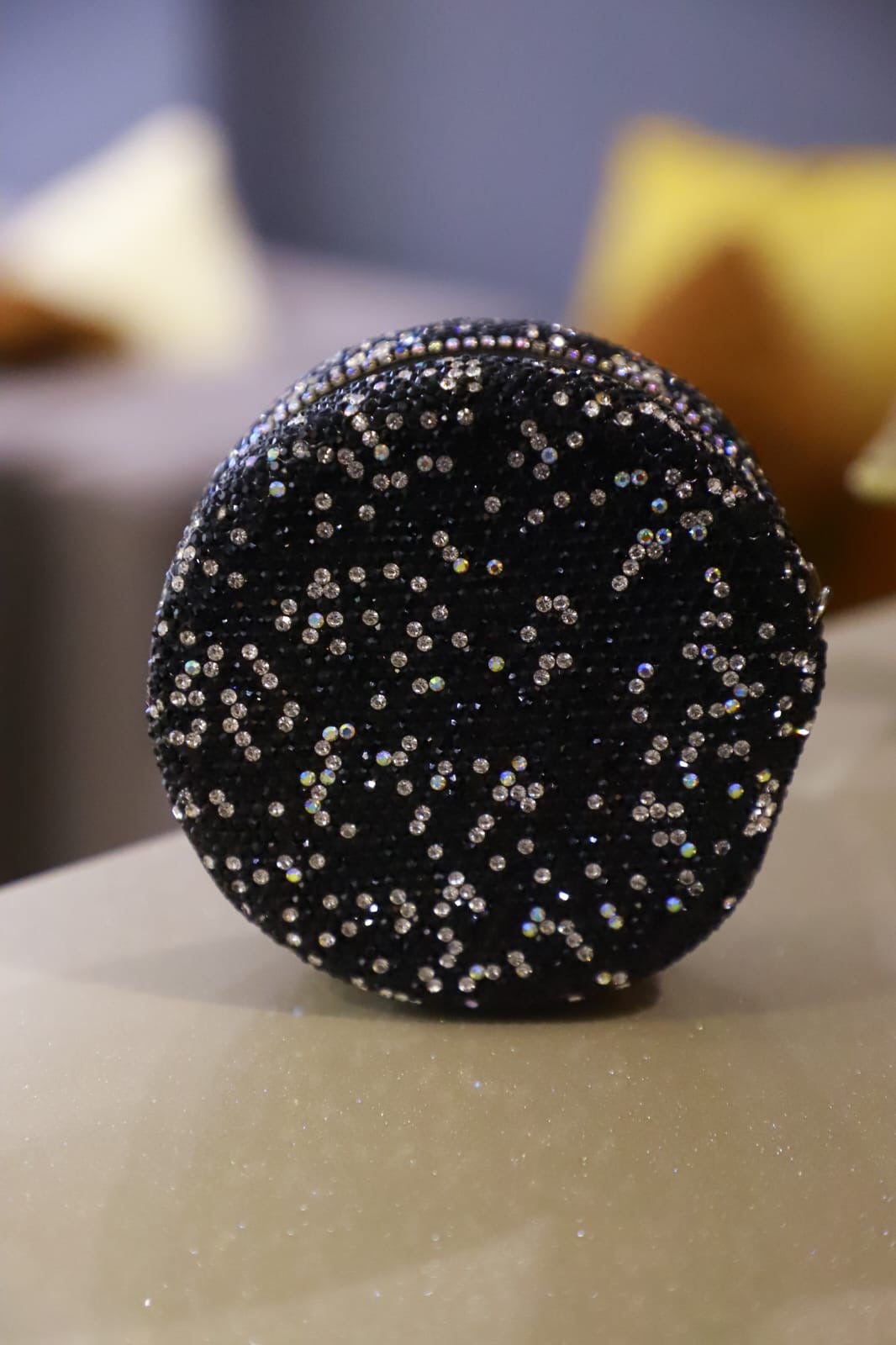 Round mini Swaroski sling clutch