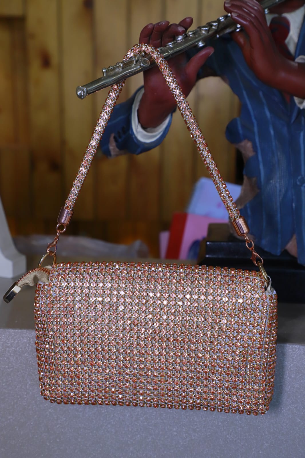 Rose gold Swaroski clutch bag