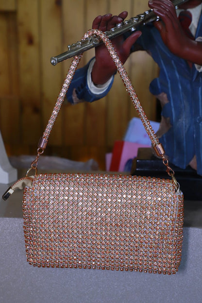 Rose gold Swaroski clutch bag