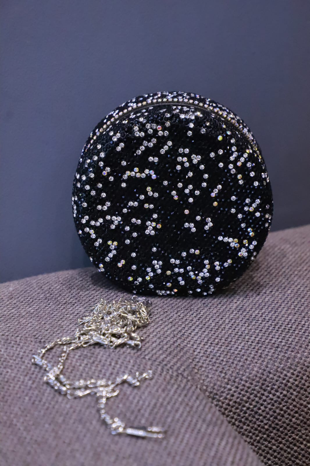 Round mini Swaroski sling clutch