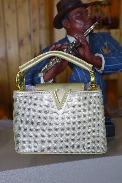 Golden Swaroski clutch bag