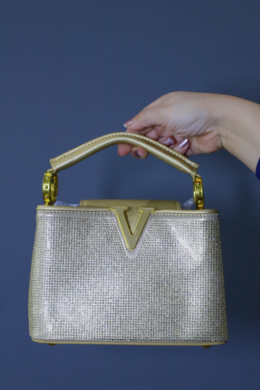 Golden Swaroski clutch bag