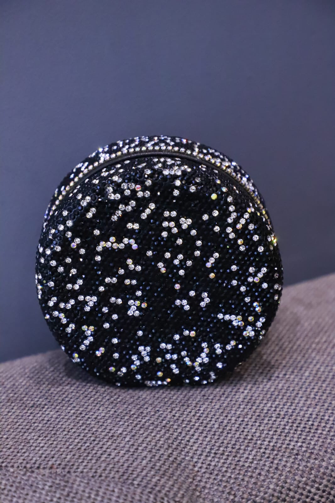 Round mini Swaroski sling clutch