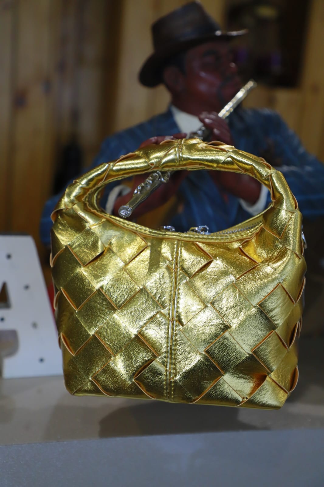 Golden rexin clutch bag