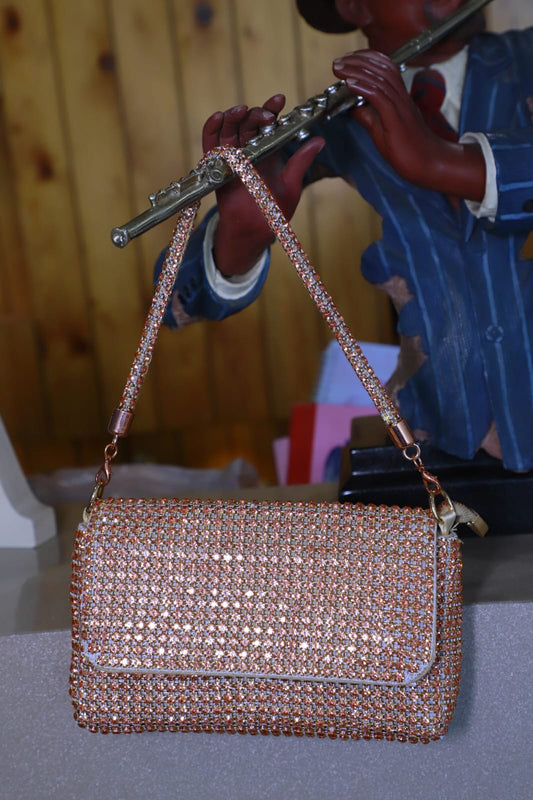 Rose gold Swaroski clutch bag