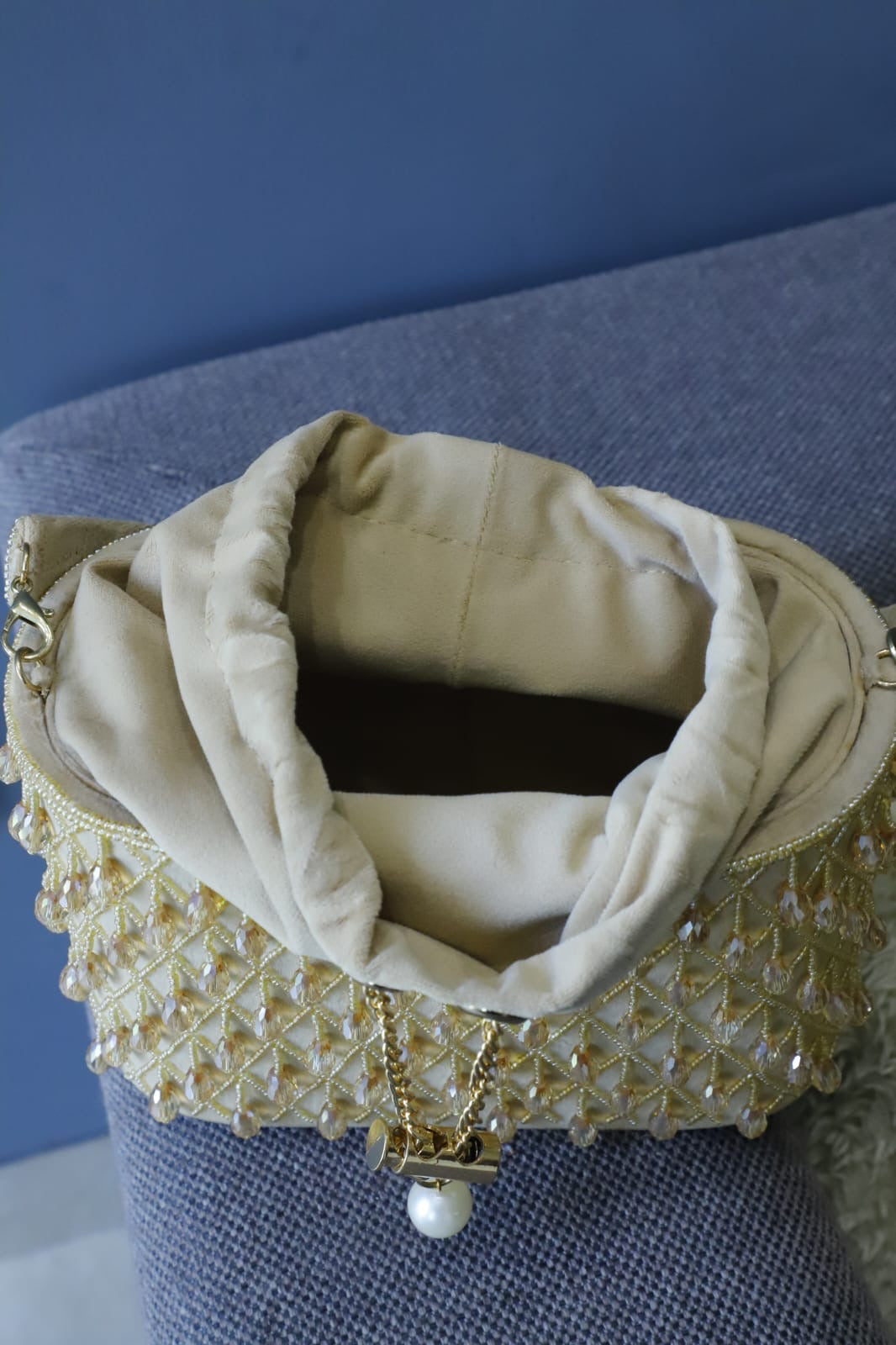 Beige crystal bucket bag