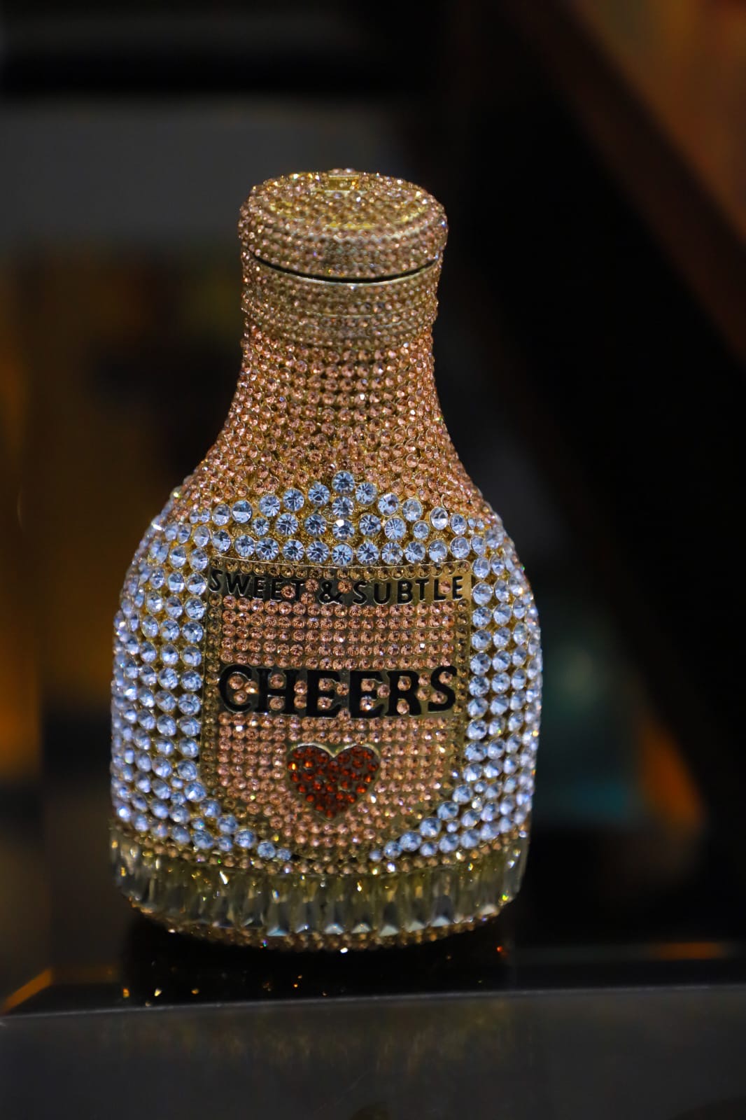Bottle swaroski clutch bag