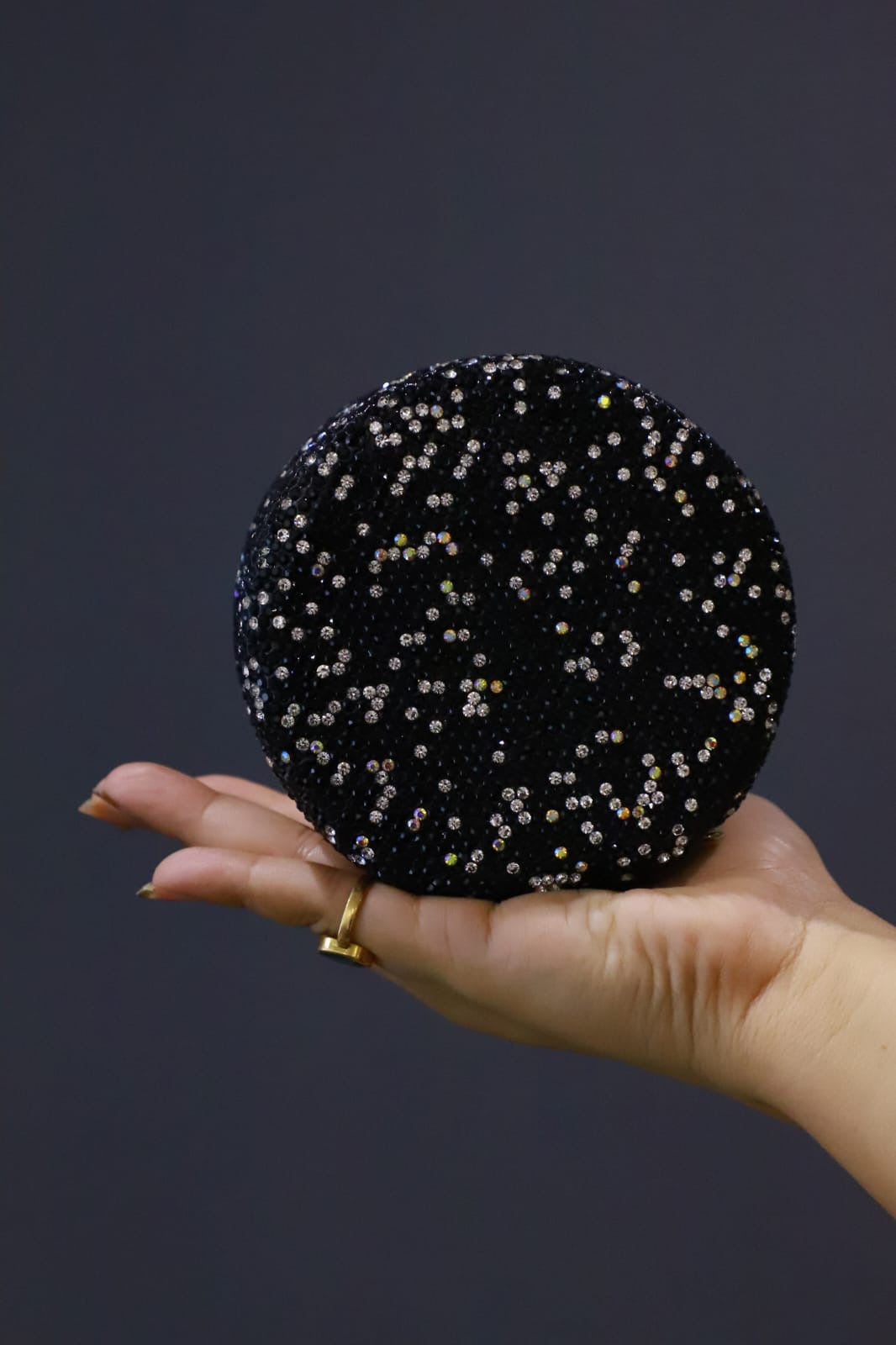 Round mini Swaroski sling clutch